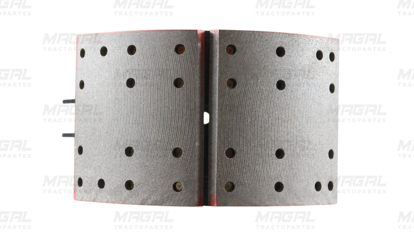 Vista frontal de balatas perforadas del kit de frenos 4711 con zapata embalatada, ideal para sistemas de frenado de vehículos pesados