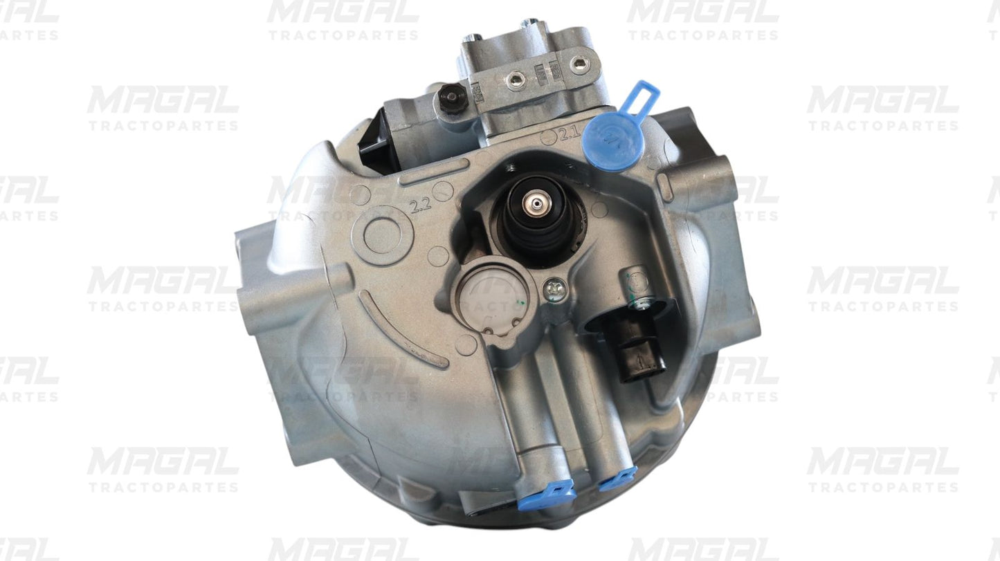 Detalle inferior del secador de aire tipo WABCO 1200SS modelo BRKE955205 mostrando conexiones neumáticas y eléctricas para tractocamión