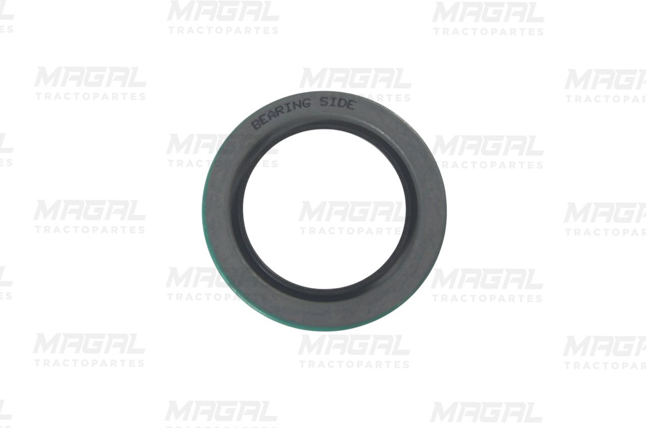 Vista superior del retén SKF 22483 color verde con leyenda "Bearing Side", ideal para sistemas de sellado en vehículos pesados


